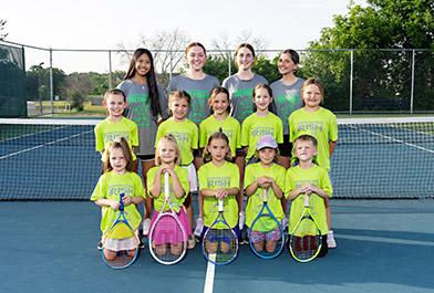 Rosemount Irish Youth Tennis Team Posing for a Group Photo On The Tennis Court